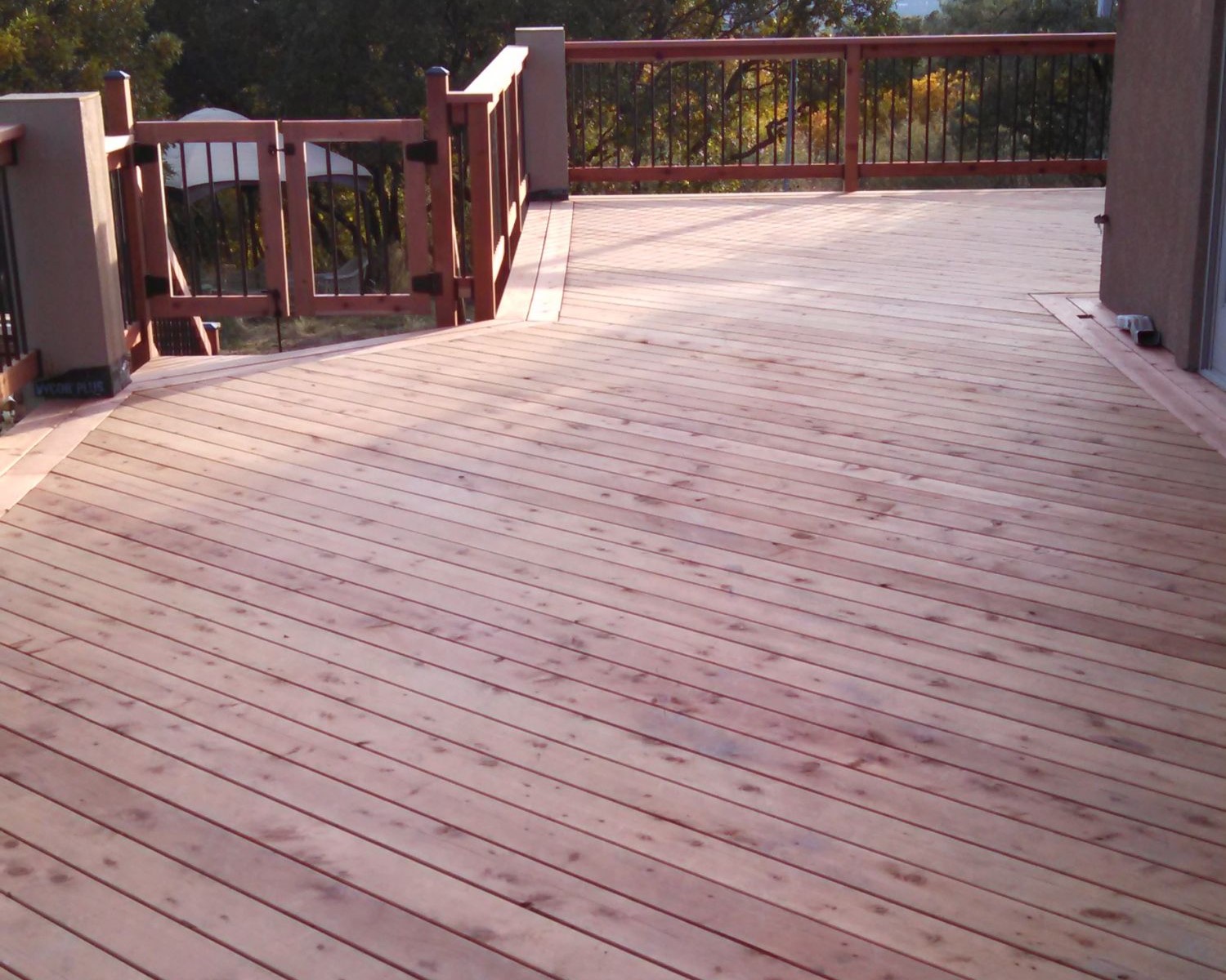 How do we stain our Redwood Deck? 