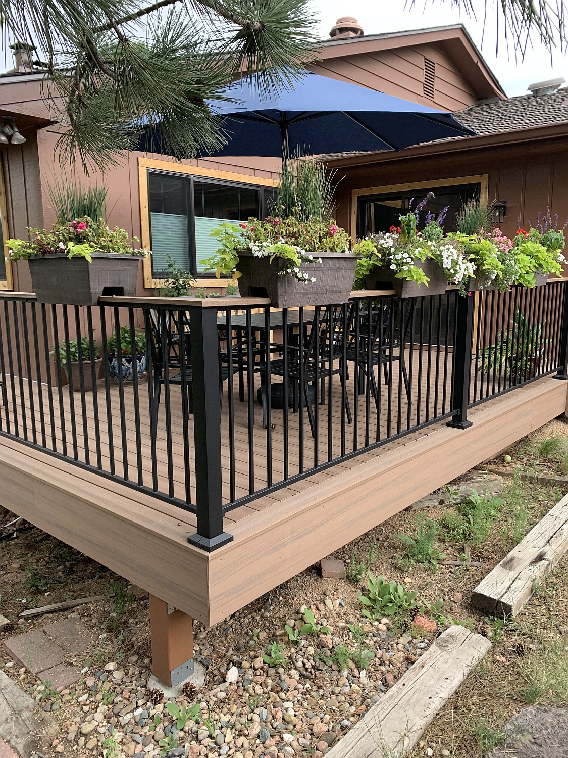 West Colorado Springs composite deck with steel deck railing creates outdoor oasis