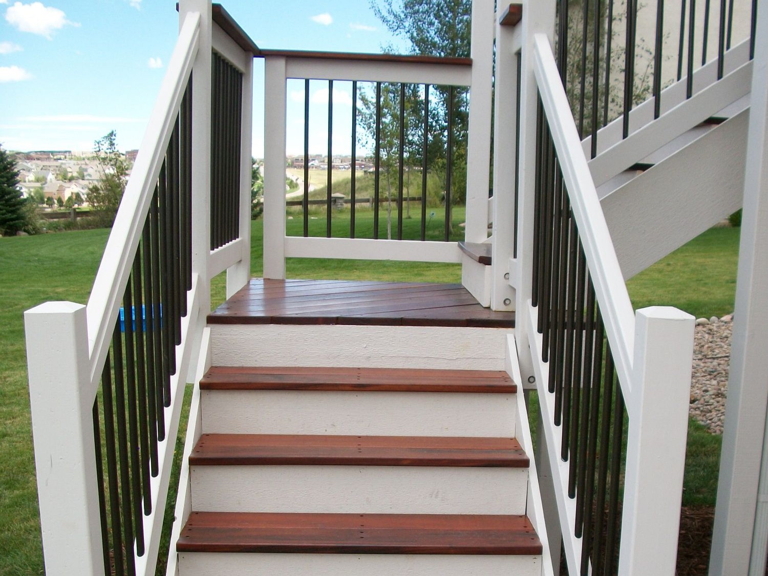 3' closed hardwood deck stairs with a 90-degree turn built in Colorado Springs