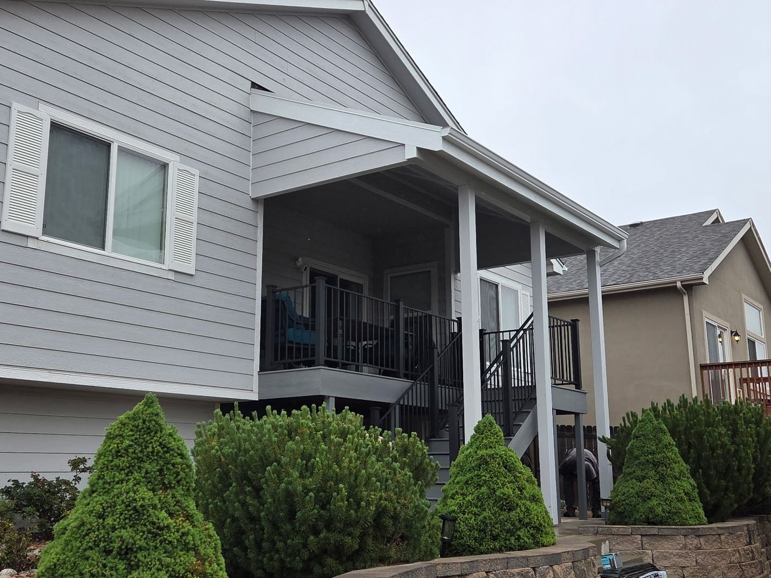 Composite deck in Colorado Springs with a new deck cover featuring a flat panel ceiling
