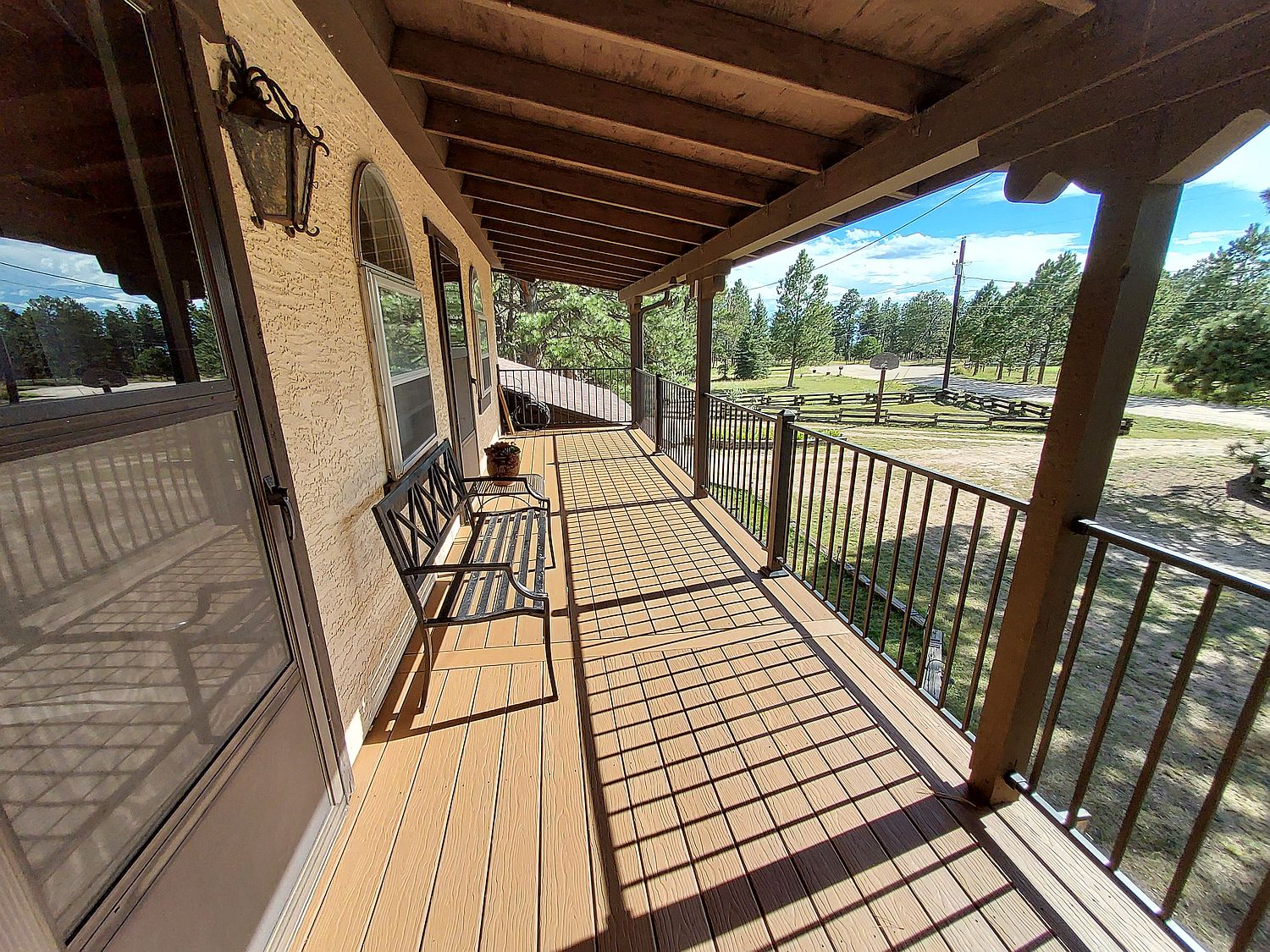 New balcony is Black Forest with MoistureShield composite decking and metal deck railing