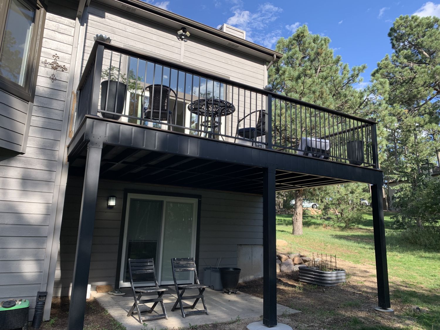 Beautiful composite deck in Monument Colorado that was built using Fortress Evolutions powder-coated steel deck framing